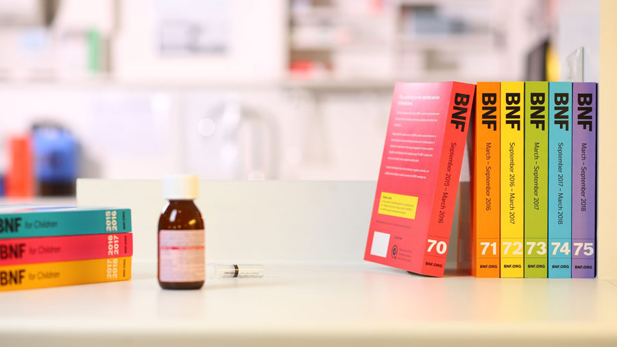 BNF books stacked on a counter in a medical lab